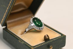 3.50 Carat Oval Cut Emerald Engagement Ring. 1TCW Diamond Halo Platinum Ring
