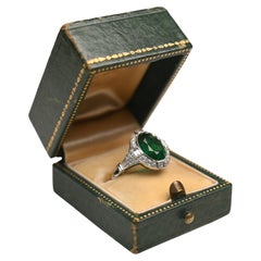 3.50 Carat Oval Cut Emerald Engagement Ring. 1TCW Diamond Halo Platinum Ring