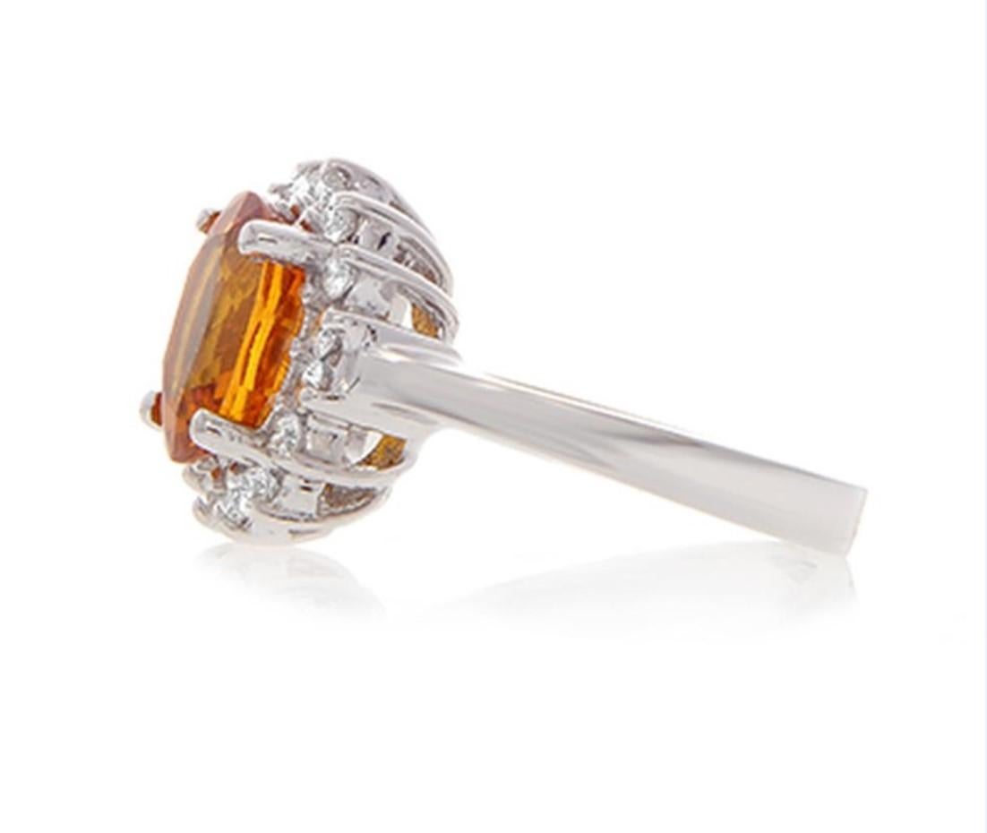 Contemporary 3.50 Carat Oval Cut Orange Sapphire Gemstone 14 Karat White Gold Diamond Ring For Sale