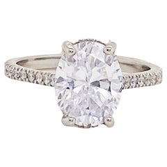 Bague de fiançailles en or 19 carats avec diamant ovale de 3,50 carats et diamants sur anneau