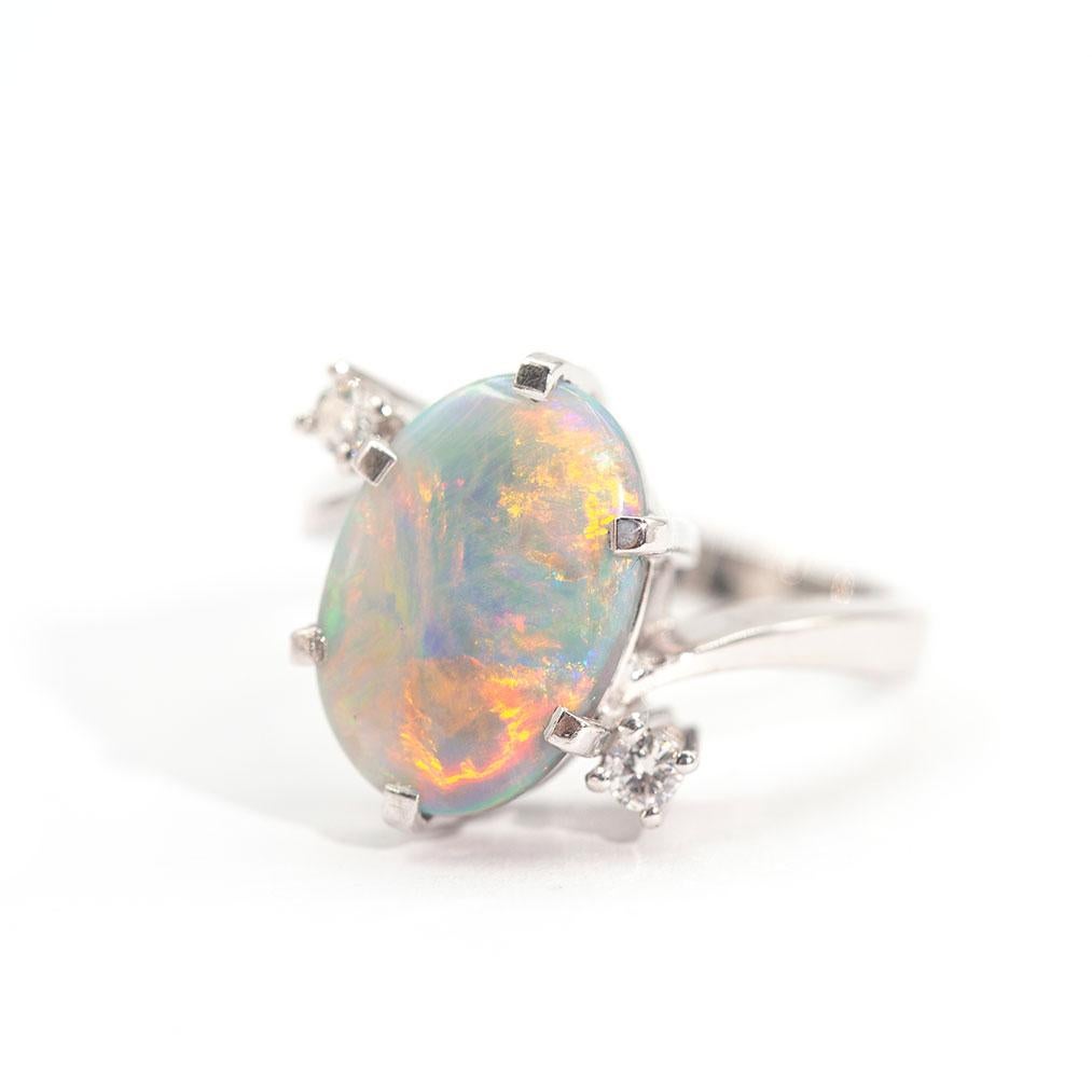 3.50 Carat Oval Solid Opal and Round Brilliant Vintage 18 Carat White Gold Ring For Sale 5
