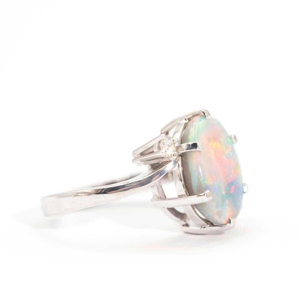 Cabochon 3.50 Carat Oval Solid Opal and Round Brilliant Vintage 18 Carat White Gold Ring For Sale