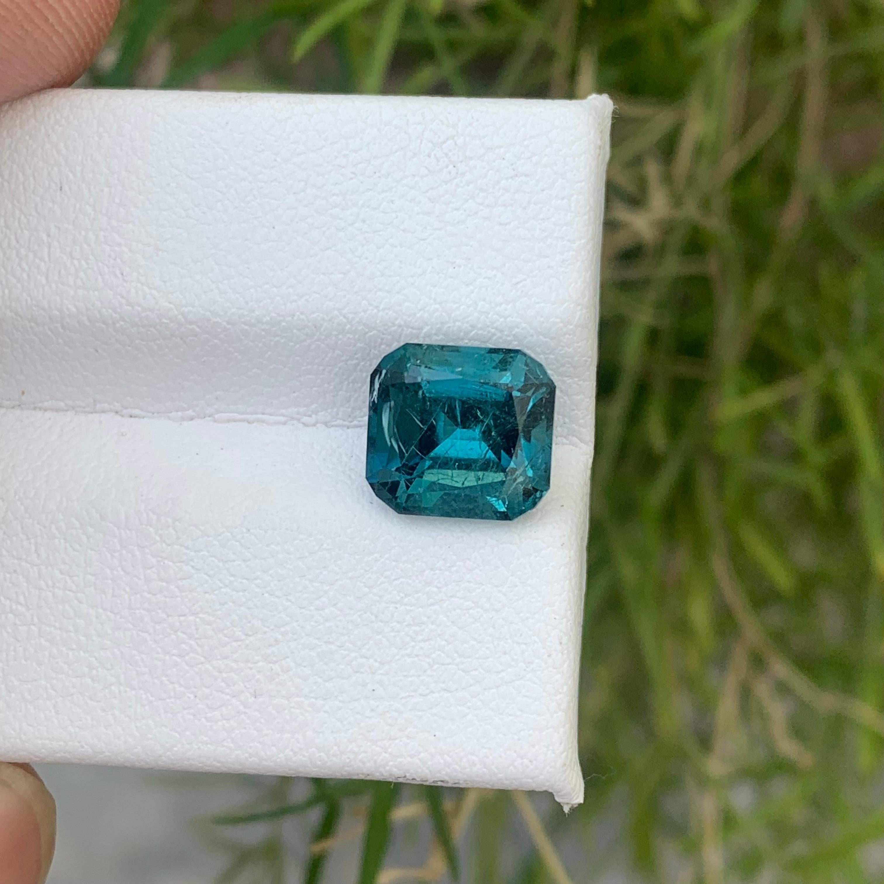 Included Loose Indicolite Tourmaline
Weight: 3.50 Carats
Dimension: 8.9x8.2x6.4 Mm
Origin; Kunar Afghanistan Mine
Color: Neon blue
Shape: Cushion
Clarity: Included
Treatment: Non
Certificate: On Demand
Indicolite tourmalines (tourmalines with blue