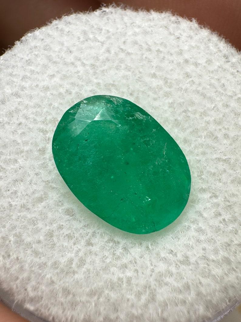 Stone: Emerald
Weight: 3.50-carats
Shape: Oval Cut
Clarity: Semi-Transparent
Luster: Good
Color: Medium Green
Measurements: 11.70mm x 8.58mm x 5.74mm
Geographic Origin: Colombia
Treatment: Natural, Oiling

Comments: Due to their growth conditions in