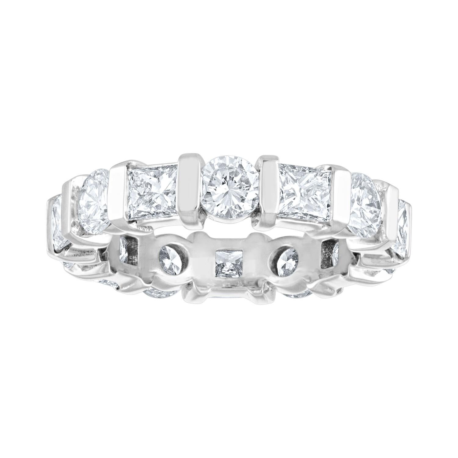Beautiful Eternity Band with Alternating Round & Princess Diamonds
The ring is 18KW Gold.
There are 1.80 Carats In Round Diamonds G/H VS
There are 1.70 Carats In Princess Diamonds G/H VS
The ring weighs 5.4 grams
The ring is a size 5.5, cannot be