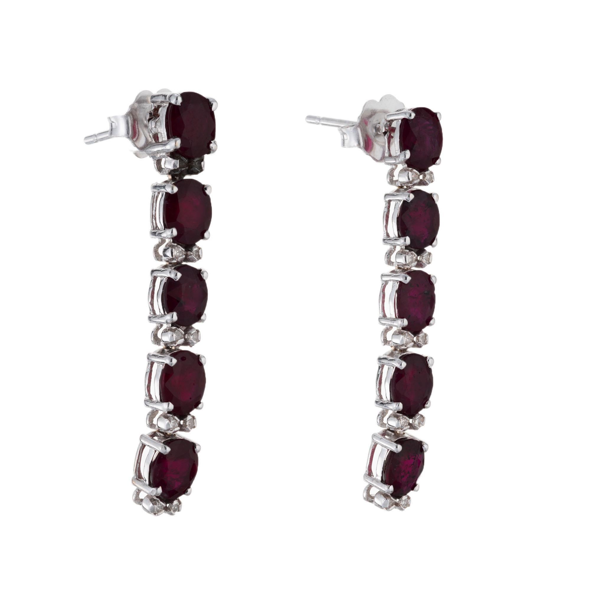 3.50 Carat Ruby Diamond Dangle Drop Earrings. 10 oval rubies with  20 round double diamond spacers in 18k white gold. 

10 Oval rubies approx total weight. 3.50cts
20 Round diamonds approx. total weight: .06cts I-J, SI1
18k white gold 
Length: 32.31