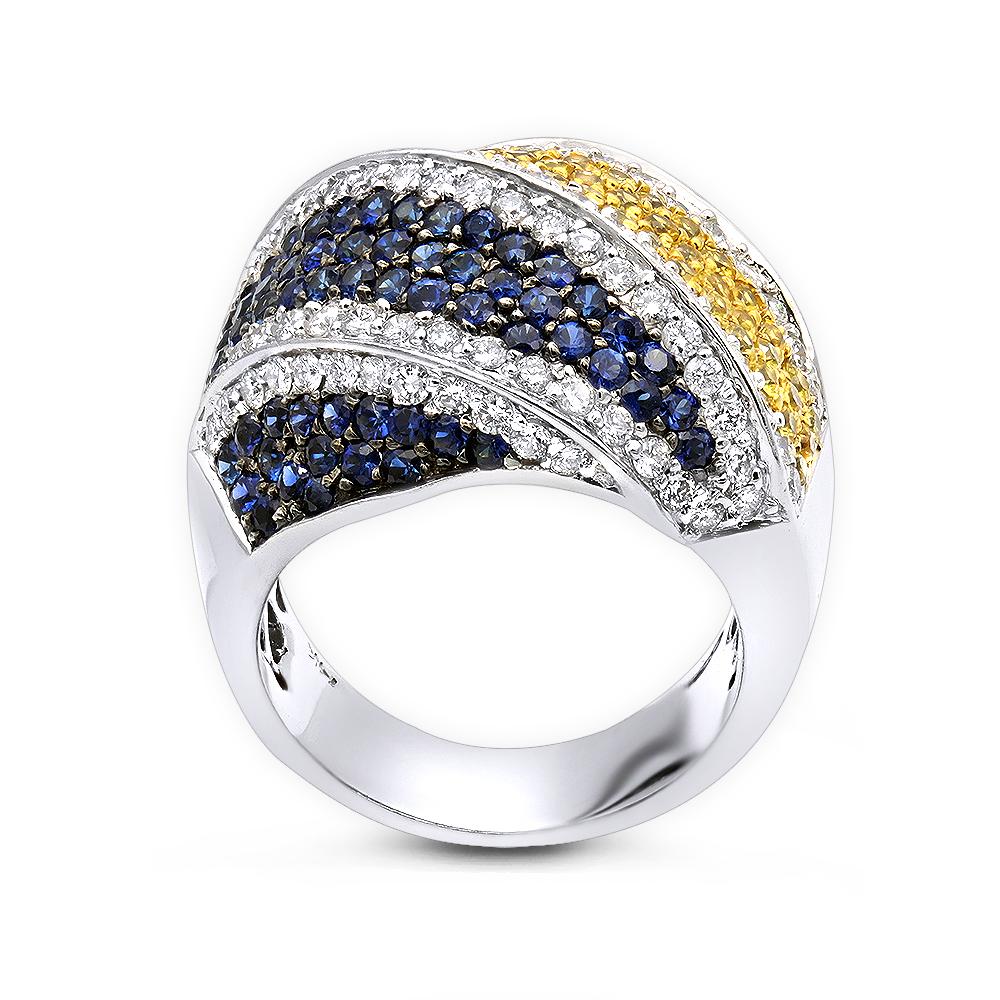 Ladies beautiful multicolor diamond sapphire cocktail ring.
3.50 carat round cut yellow and blue sapphires.
Surrounded by 1.50 carat round brilliant cut diamonds.
Handcrafted in 14k white gold.
14.9 grams.
