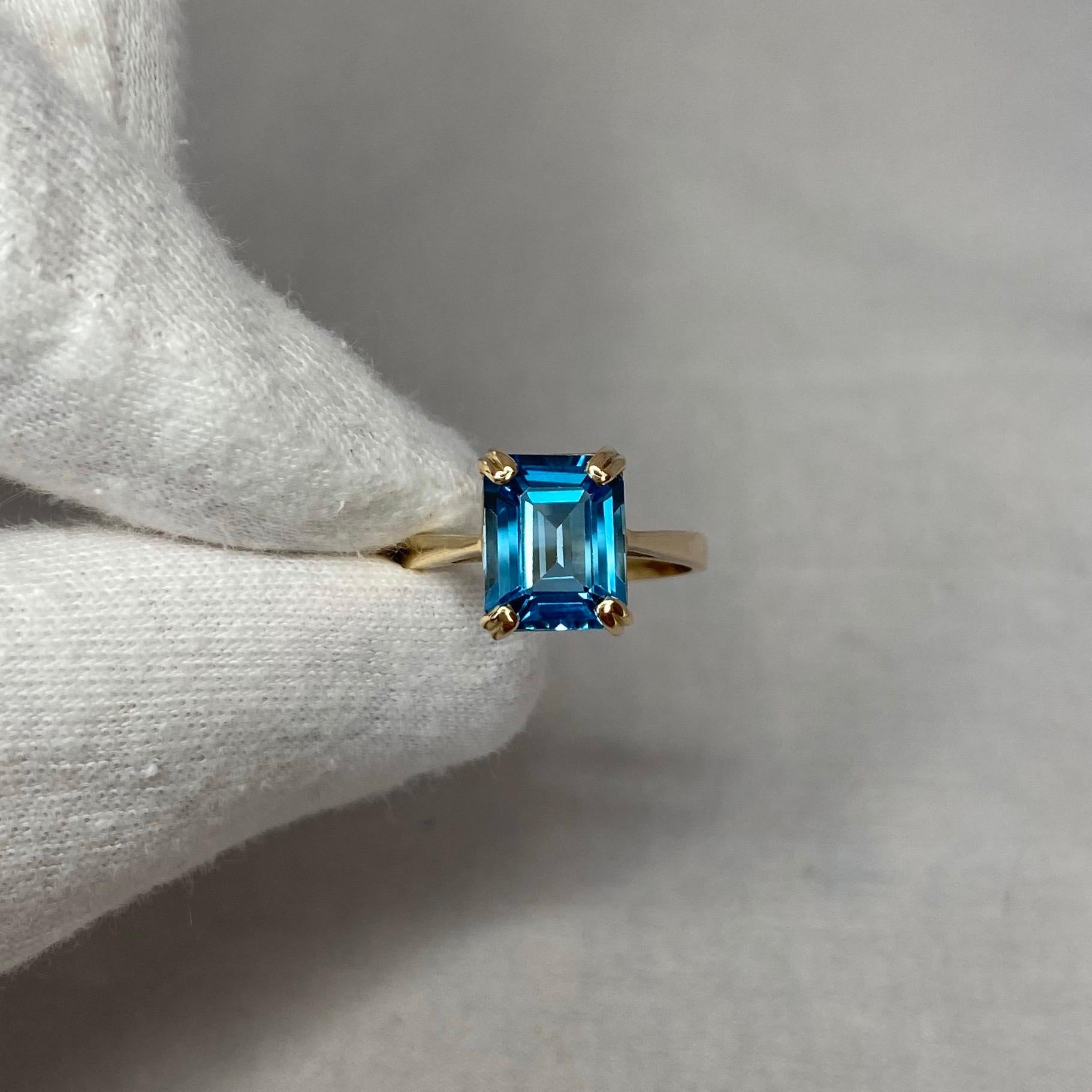 3.50 Carat Swiss Blue Topaz Emerald Cut Yellow Gold Solitaire Ring In New Condition In Birmingham, GB
