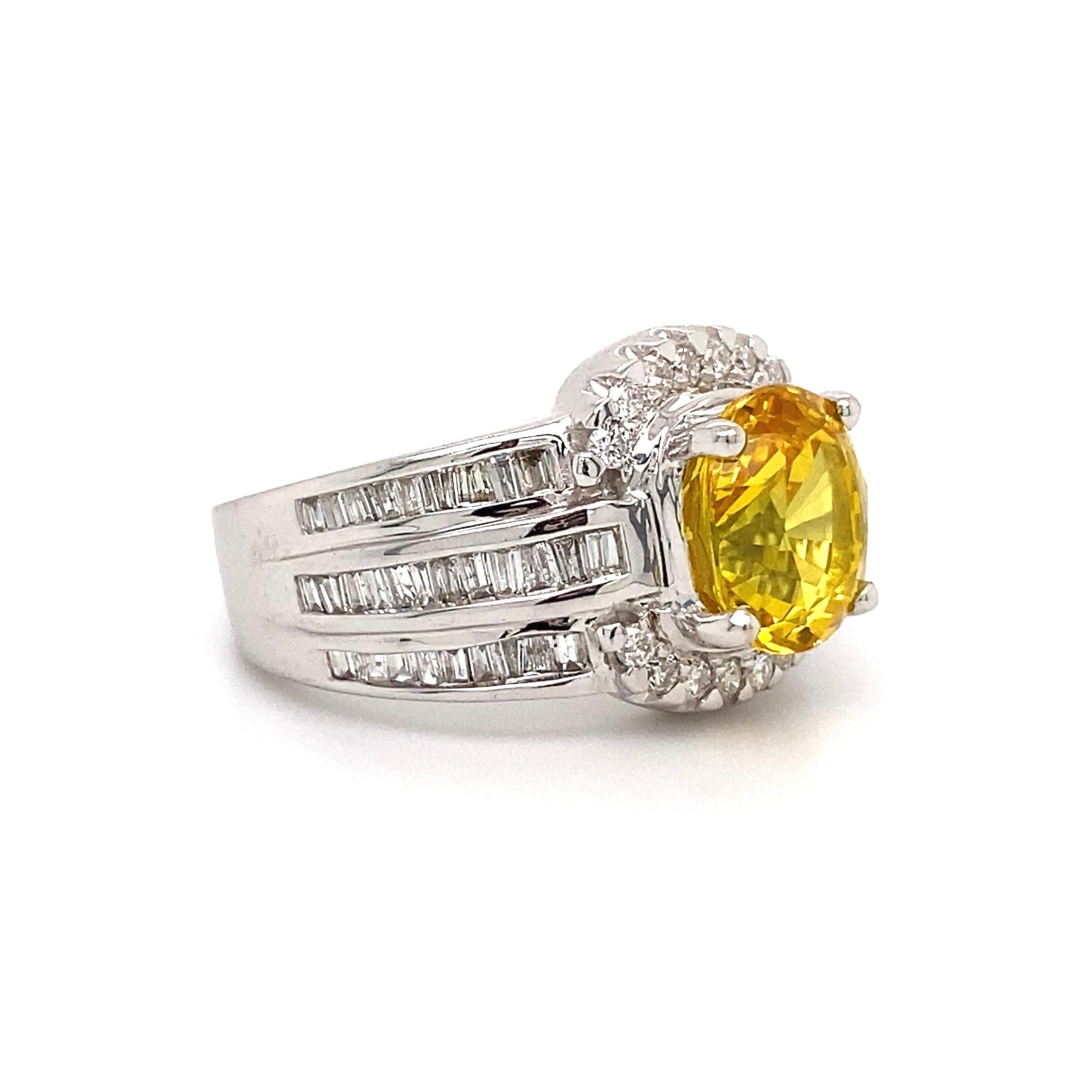 Simply Beautiful! Finely detailed Yellow Sapphire GIA and Diamond Gold Show Stopper Ring. Centering a securely nestled  3.50 Carat diffused Yellow Sapphire GIA. Surrounded by Diamonds, weighing approx. 0.80tcw. Hand crafted 14K white Gold mounting.