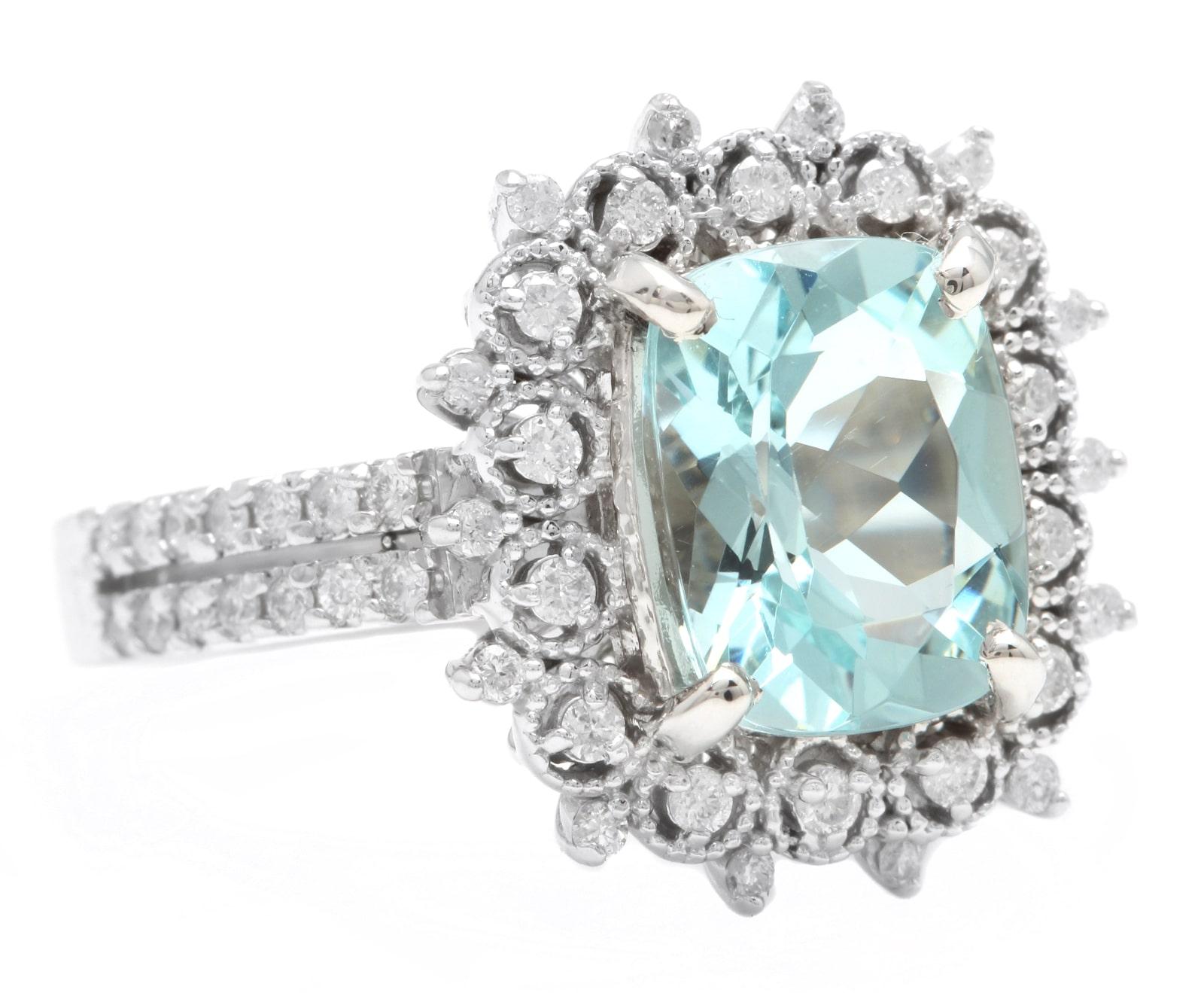3.50 Carats Natural Aquamarine and Diamond 14K Solid White Gold Ring

Suggested Replacement Value: Approx. $5,500.00

Total Natural Cushion Aquamarine Weights: Approx. 3.00 Carats 

Aquamarine Measures: Approx. 10.00 x 8.00mm

Aquamarine Treatment: