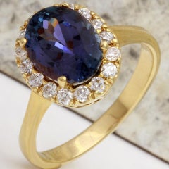 3.50 Carat Natural Tanzanite and Diamond 14 Karat Solid Yellow Gold Ring