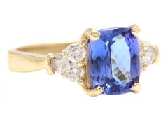 3.50 Carats Natural Tanzanite and Diamond 14K Solid Yellow Gold Ring