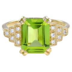 3.50 Ct. Emerald Cut Peridot and Step Diamond Engagement Ring in 18K Yellow Gold
