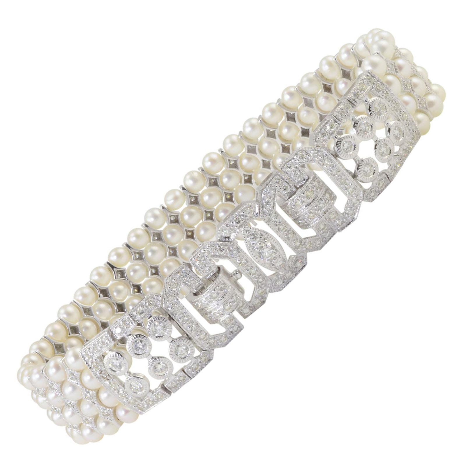 3.50 CTW Diamond and Four Strand Pearl Bracelet For Sale