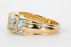 3.50 CTW Oval Aquamarine Ring in 14K Yellow Gold