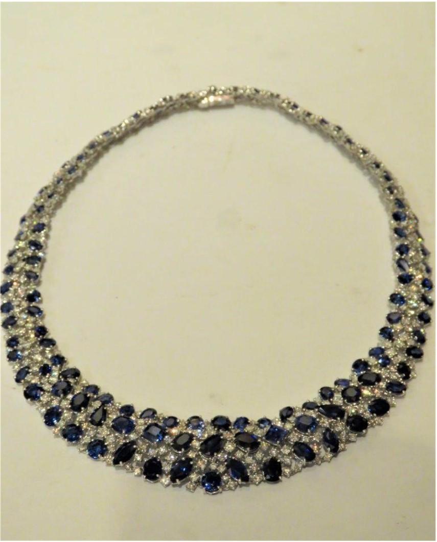 The Following Items we are offering is a Rare Important Estate Radiant 18KT White Gold Ceylon Blue Sapphire Diamond Necklace consisting of over 90 CTS of Fine Round, Oval, Emerald, and Pear Shaped Ceylon Blue Sapphires and Diamonds and Diamonds