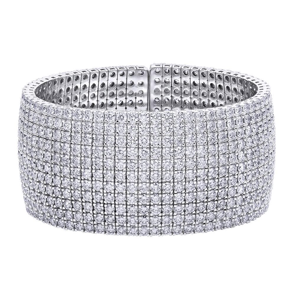 35.05 Carat 18 Karat White Gold Flexible Diamond Cuff Bracelet

A Sensational handmade 18k White Gold 11 Row diamond bracelet containing 35.05 round cut brilliant diamonds hugs your wrist 