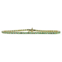 3.50ct Green Emerald 8" Tennis Bracelet set in 14k Yellow Gold