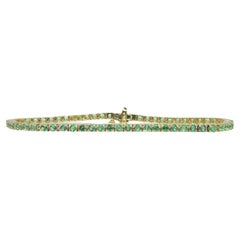 3.50ct Green Emerald 8" Tennis Bracelet set in 14k Yellow Gold