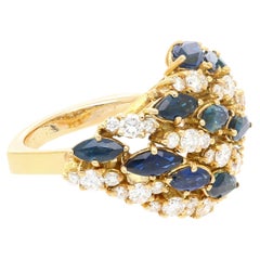 3.50ct Marquise Cut Blue Sapphire & 1ct Diamond Cluster Ring in 18k Yellow Gold