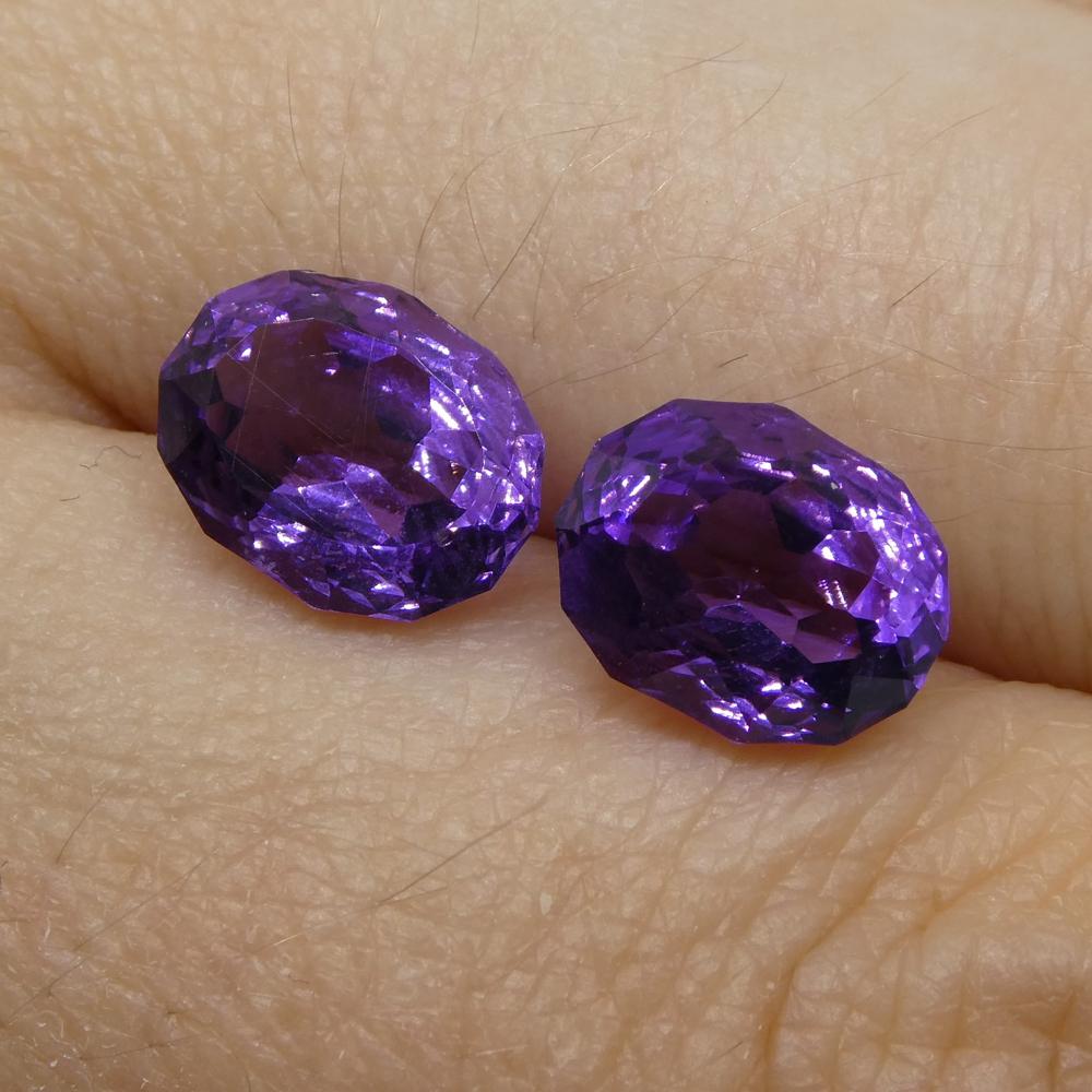 Description:

Gem Type: Amethyst
Number of Stones: 2
Weight: 3.5 cts
Measurements: 9.00 x 7.00 x 5.00 mm
Shape: Oval
Cutting Style Crown: Modified Brilliant
Cutting Style Pavilion: Mixed Cut
Transparency: Transparent
Clarity: Very Slightly Included: