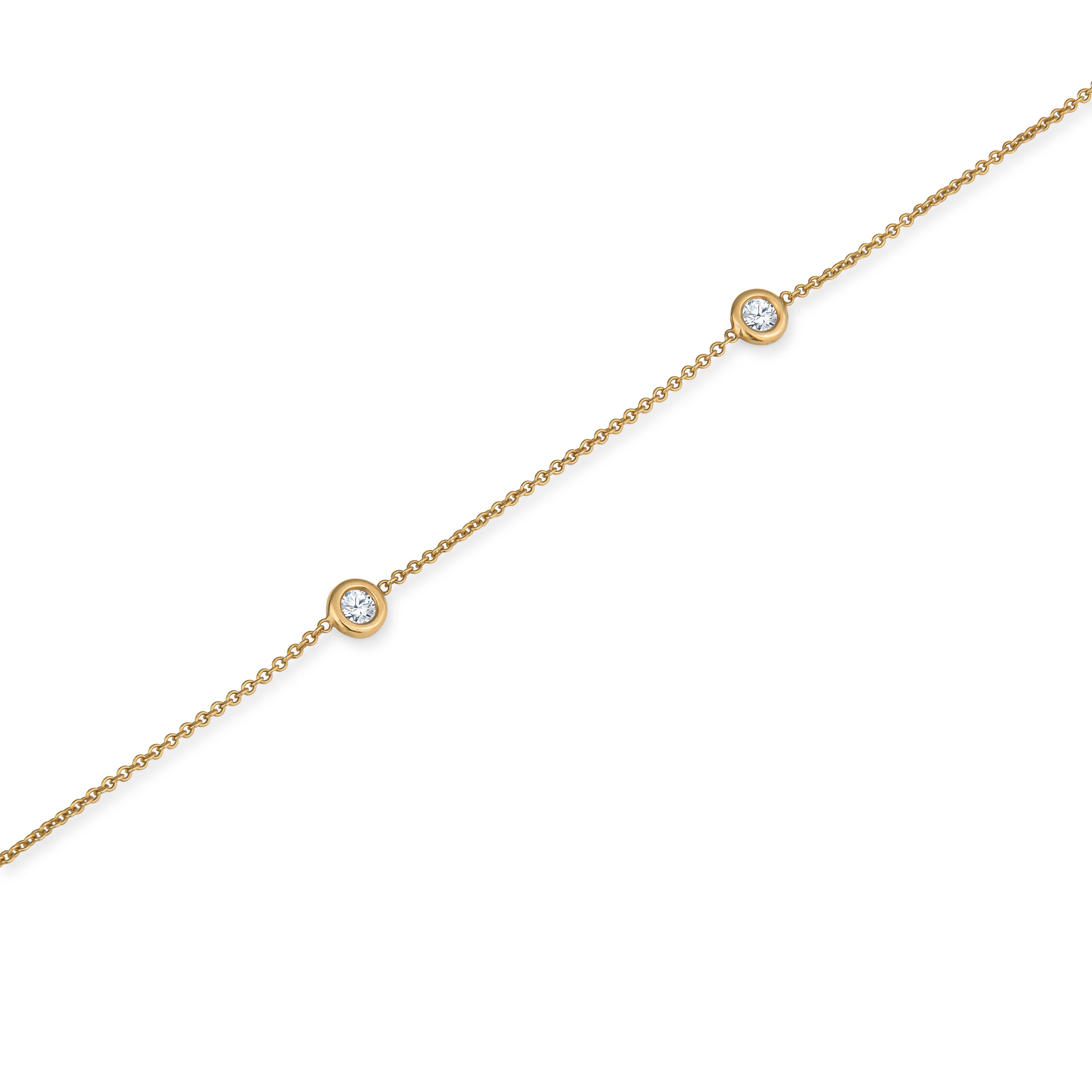 This station necklace is part of our Soft Glamour collection. It features 3.50ctw in round brilliant diamonds that are set in an 18kt yellow gold, 35 inch chain. It is the ideal necklace to add elegance for everyday wear.