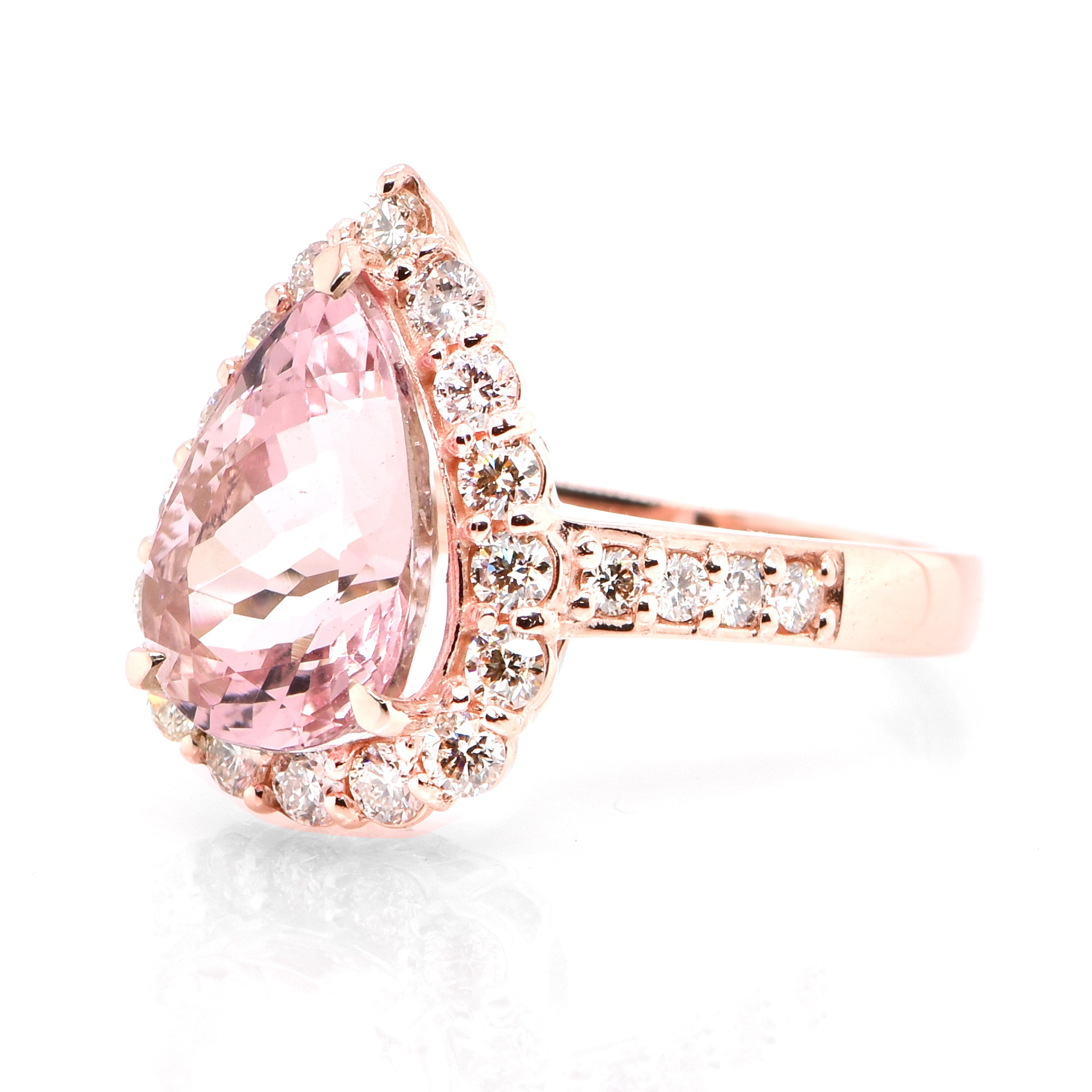 A beautiful Cocktail Ring featuring a 3.51 Carat, Natural Morganite (Pink Beryl) and 0.80 Carats of Diamond Accents set in 18 Karat Rose Gold. Having been first discovered in the early 1900s, Morganite was named after the famed banker and gem