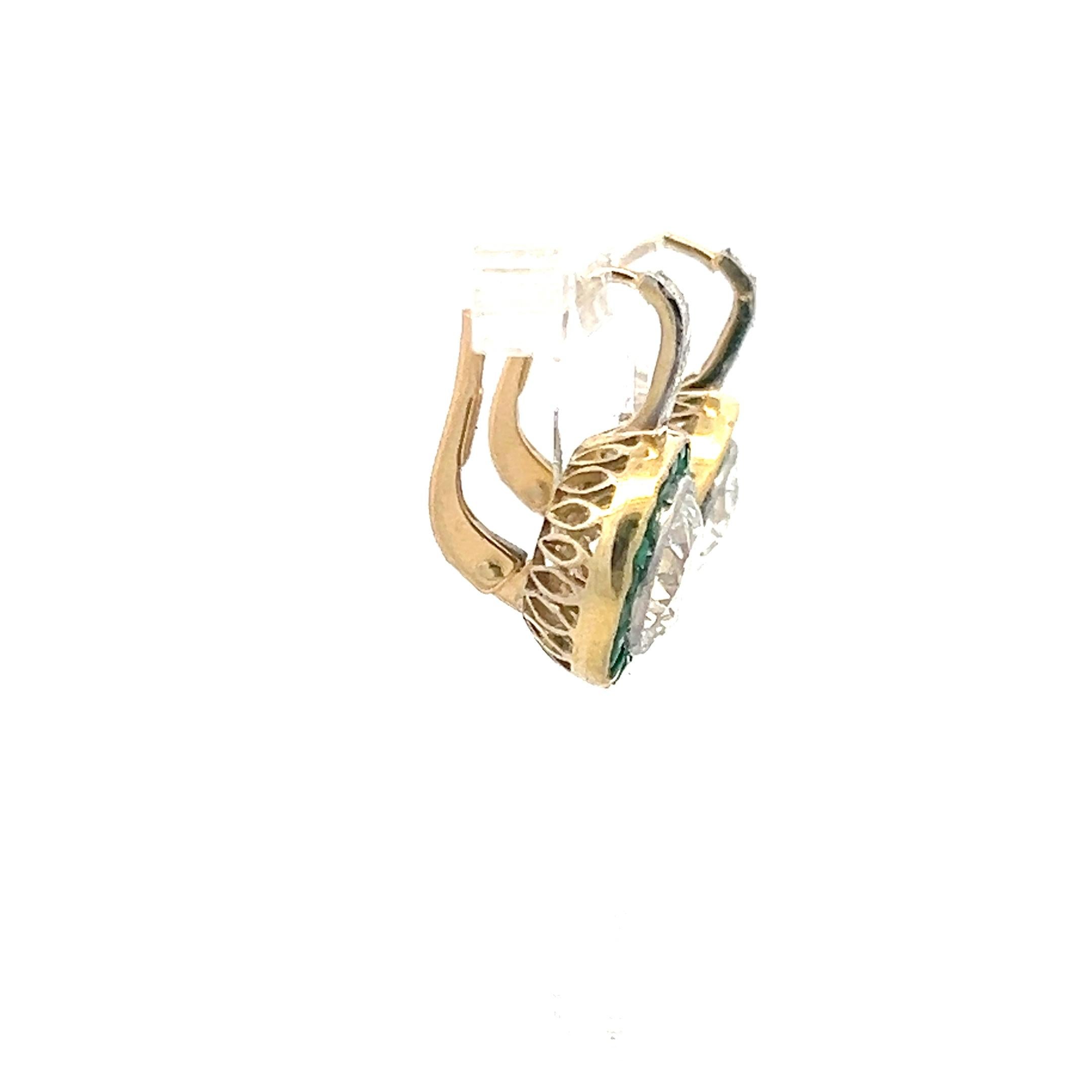 Title:
3.51 Carat Old European Cut J-K I1 and Circular Brilliant Cut J I1 Diamond 0.60 Carat Tapered Baguette Shape Emerald 18 Karat Two Tone Gold/Platinum Leverback Earrings
Style:
Leverback
Metal:
18 Karat Two Tone Gold/Plat
Gemstone 1:
0.06 Carat