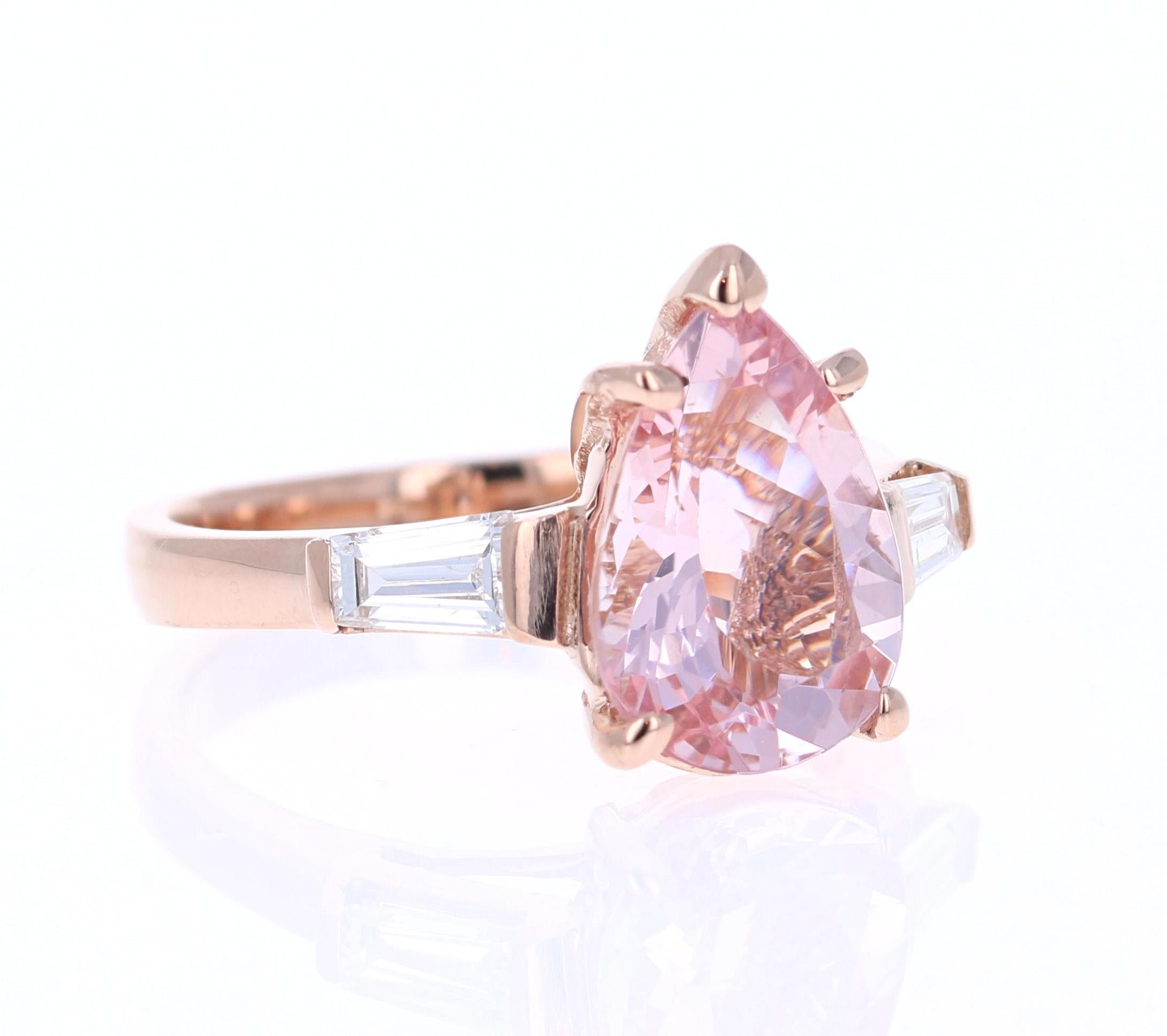3.51 Carat Pear Cut Pink Morganite Diamond Rose Gold Engagement Ring

This gorgeous and classy Morganite and Diamond Ring has a 2.94 Carat Pear Cut Pink Morganite and has 2 Baguette Cut Diamonds that weigh 0.57 carats (Clarity: SI, Color: F). The
