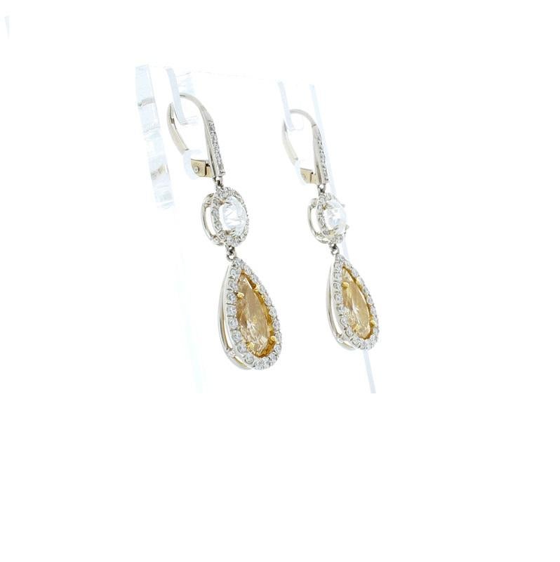 3.15 Carat Pear Shape Fancy Yellow Diamond Dangle Earrings in Platinum In New Condition In Chicago, IL
