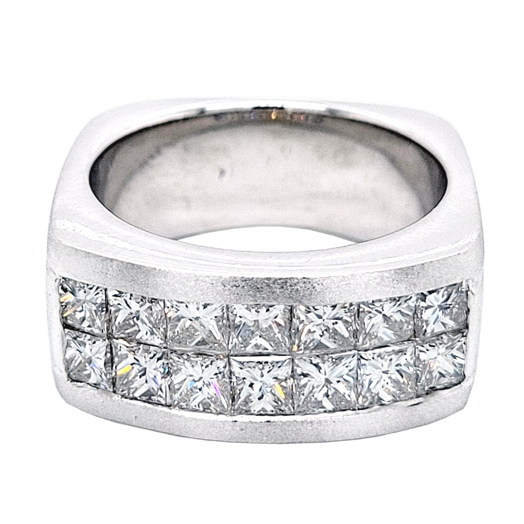 This Beautiful Gent's ring is made in 18K white gold with shiny middle and matted sides. It has 14 pieces of perfectly matched 3.4 mm princess cut diamonds (Total Weight 3.51 Ct) invisible set on the top. The ring is square shaped shank.
Total