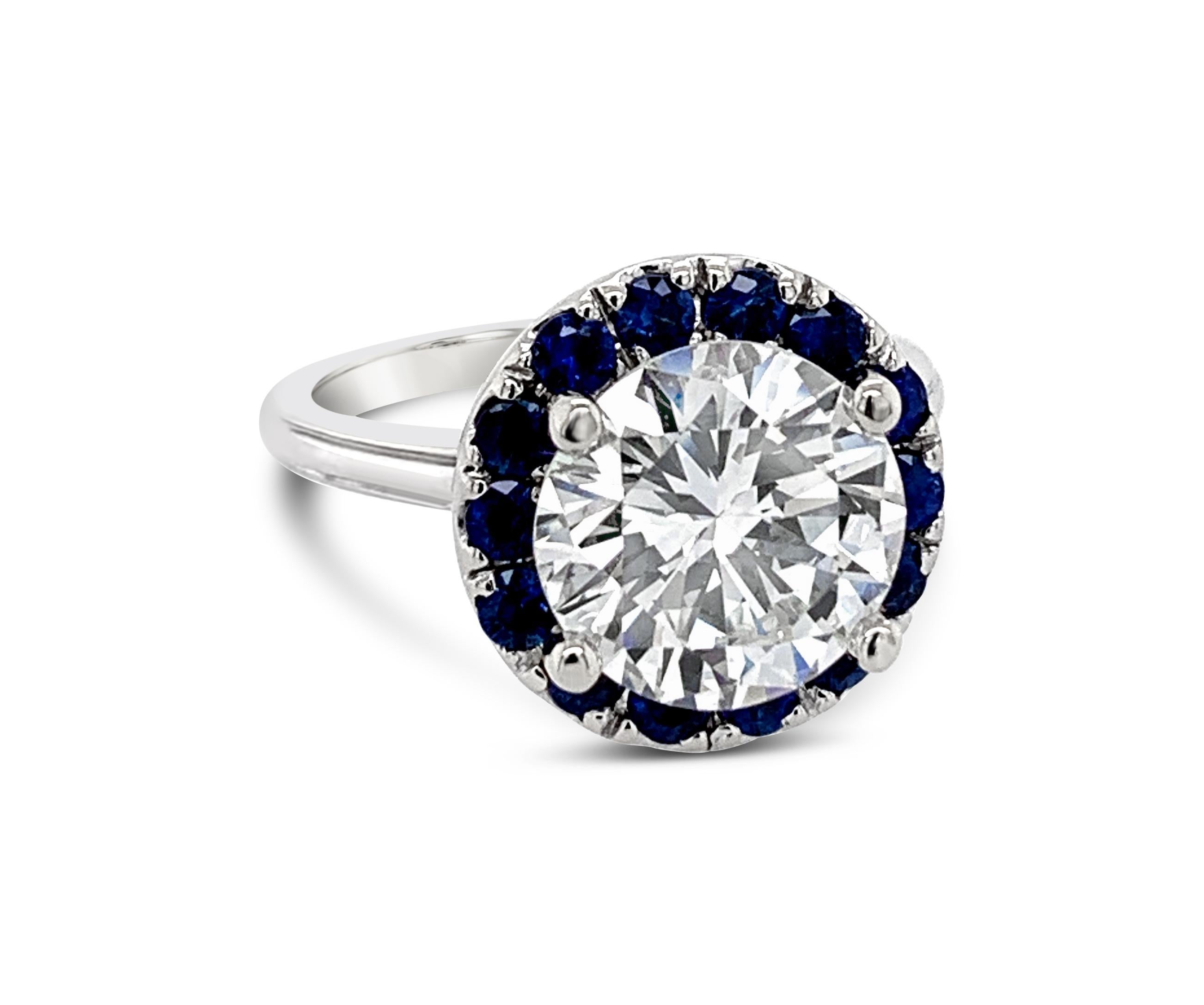 round diamond with sapphire halo