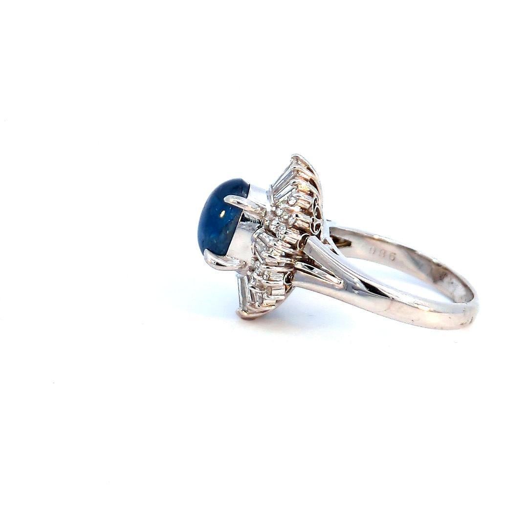 Elevate your style with our exquisite 3.51 Carat Sapphire Cabochon and 0.58 Carat Diamond Ring, a timeless masterpiece crafted in lustrous platinum. This ring seamlessly blends the captivating allure of a sapphire cabochon with the brilliance of