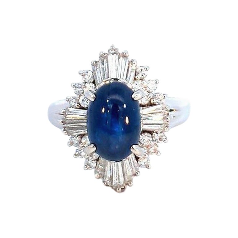 3.51 Carat Sapphire Cabochon and 0.58 Carat Diamond Ring in Platinum For Sale
