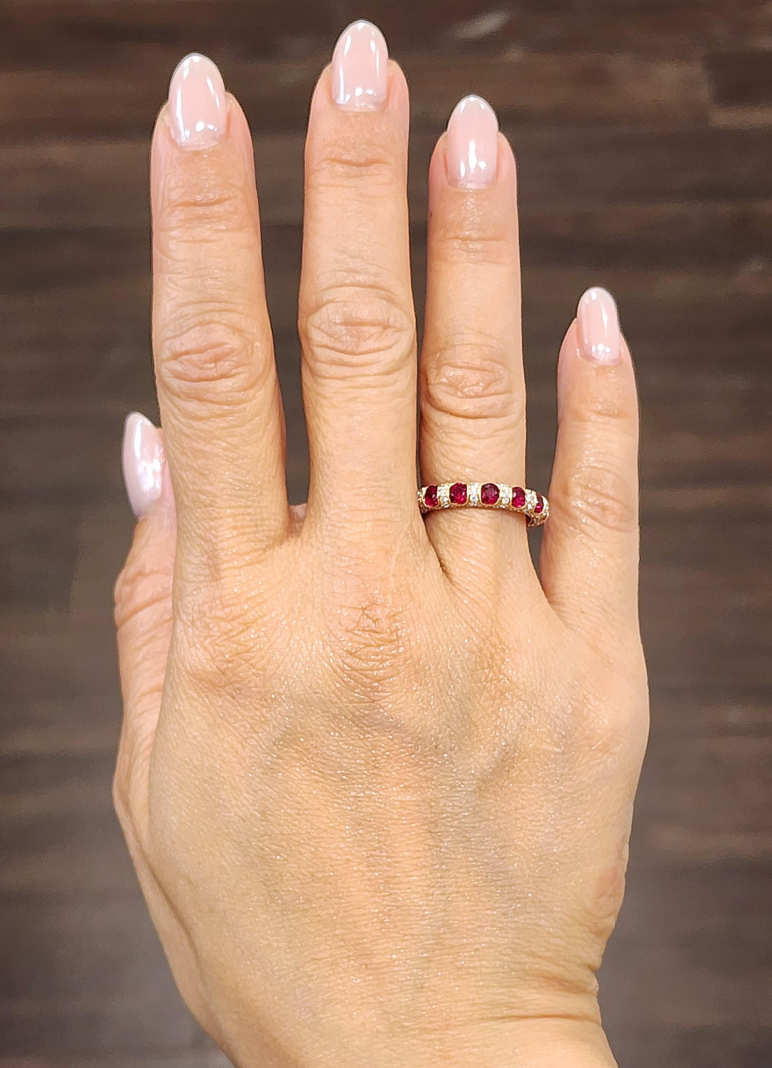 This beautiful ruby and diamond eternity band features 14 natural rubies weighing 2.32 ct and 154 natural diamonds weighing 1.19 ct. This beauty is set in 18k rose gold, and is an amazing addition to any wardrobe. 

