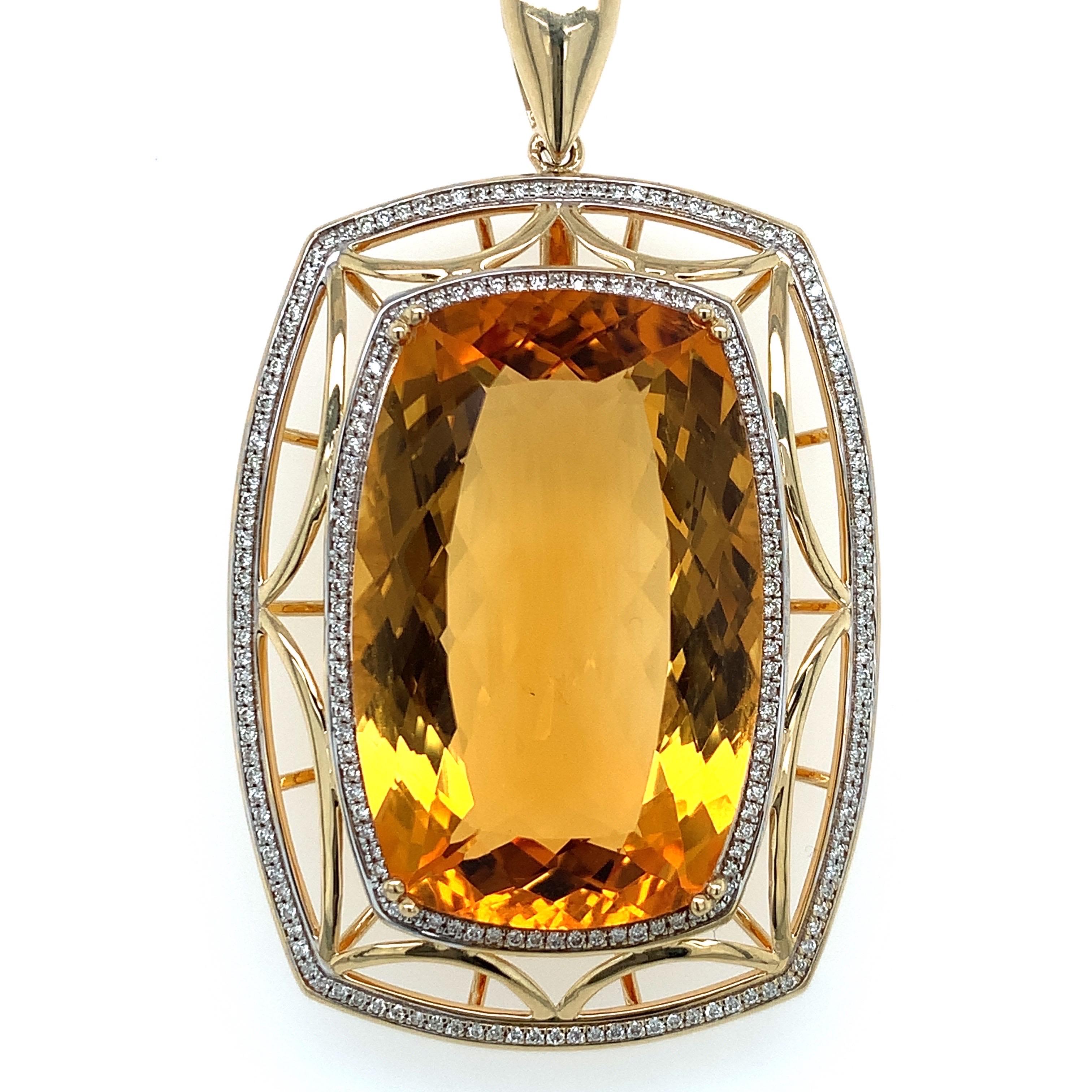 Glamorous bold citrine pendant. High brilliance golden honey tone, transparent clean, natural cushion faceted 35.11 carats citrine mounted in open basket with eight bead prongs, accented in round brilliant cut diamond frame. Handcrafted design set
