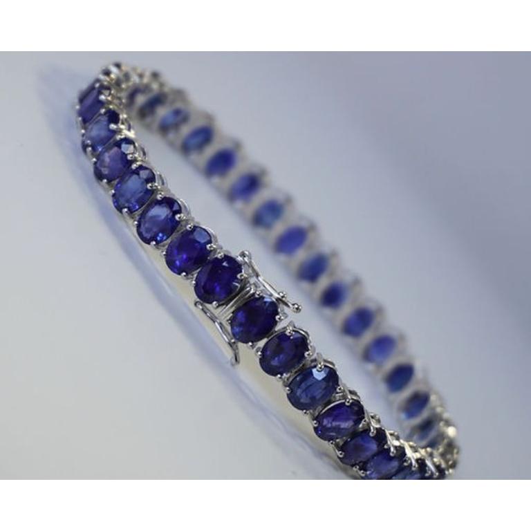 Sapphire Weight: 35.11 ct, Measurements: 7x5 mm (34 pcs), Metal: 18K White Gold, Gold Weight: 17 gm, Birthstone: September, Hardness: 9