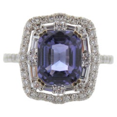 Bague en or blanc 18 carats avec saphir bleu de 3,51 carats et diamant de 0,94 carat