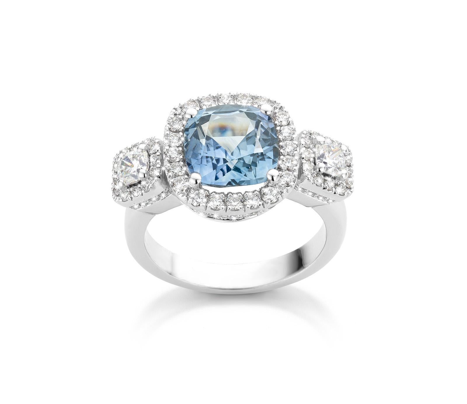 One of a kind “Emmanuelle” ring in 18K white gold 8,5g set with 1 natural, Ceylon light blue sapphire in cushion cut 3,51Ct, diamonds in princess and brilliant cut 1,09Ct (VVS-DE quality).

Because every sapphire has his own color, every piece of