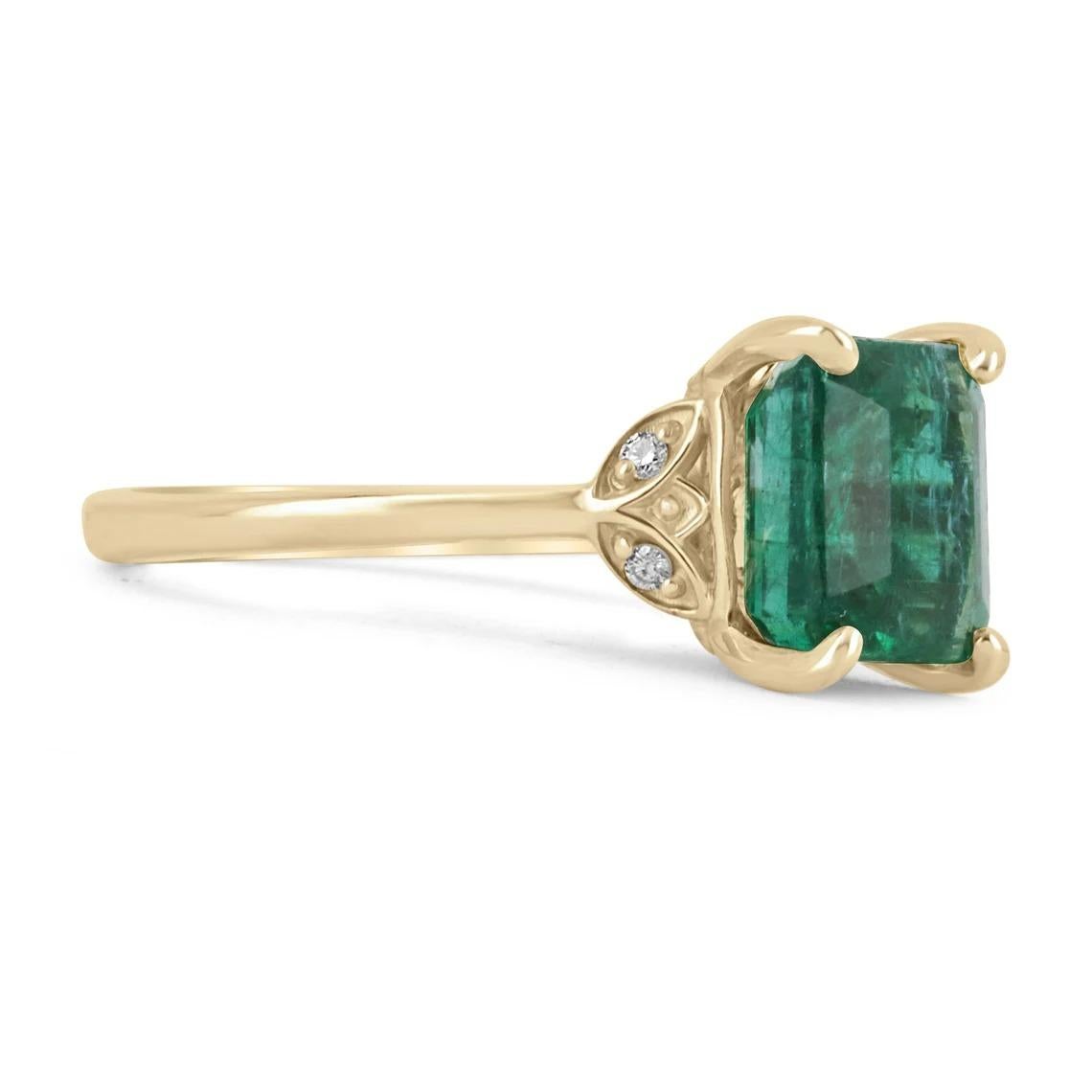 Featured is a stunning emerald and diamond ring. The center stone features a lovely, 3.48-carat natural Zambian emerald cut emerald. The gemstone has amazing characteristics, such as good eye clarity, superb luster, and a desirable dark