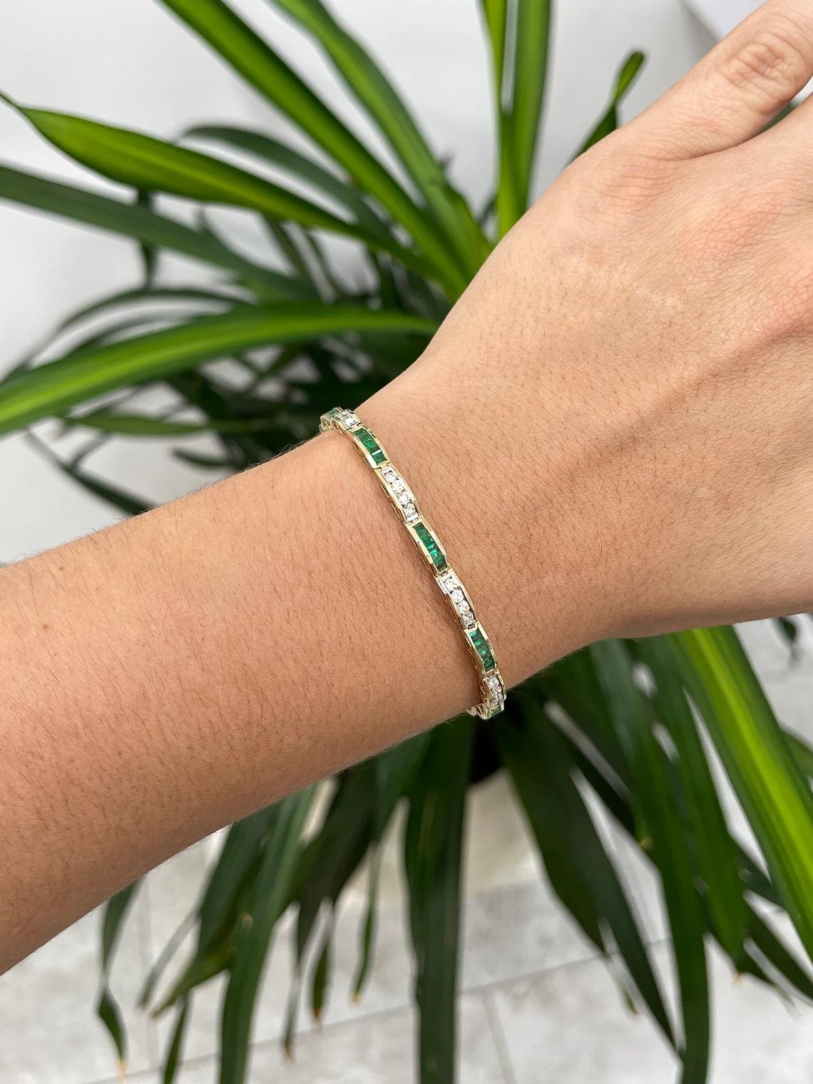 Featured is a beautiful emerald and diamond unisex bracelet. This bracelet carries almost two full carats of emeralds-emerald cut with very good clarity and luster. Channel set with numerous brilliant round cur diamonds going along the entire