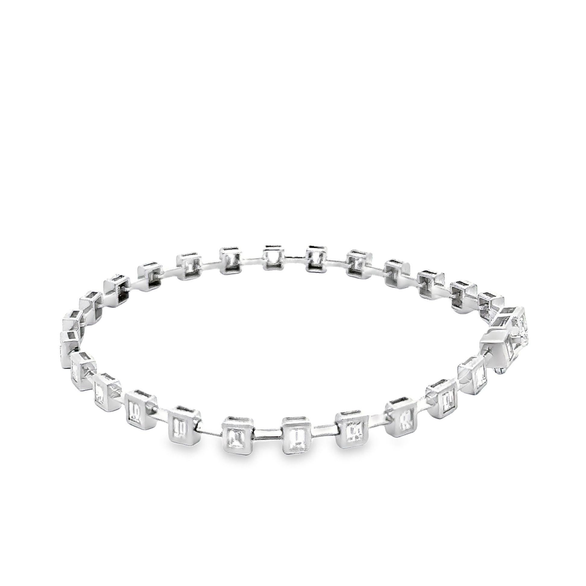 This luxurious bracelet alternates baguette-cut diamonds weighing a total of 3.52 carats. Stylish, timeless, and subtle, this bar station tennis bracelet is a forever piece as the 0.26 carat baguette-cut diamonds feature strong fire and radiance.