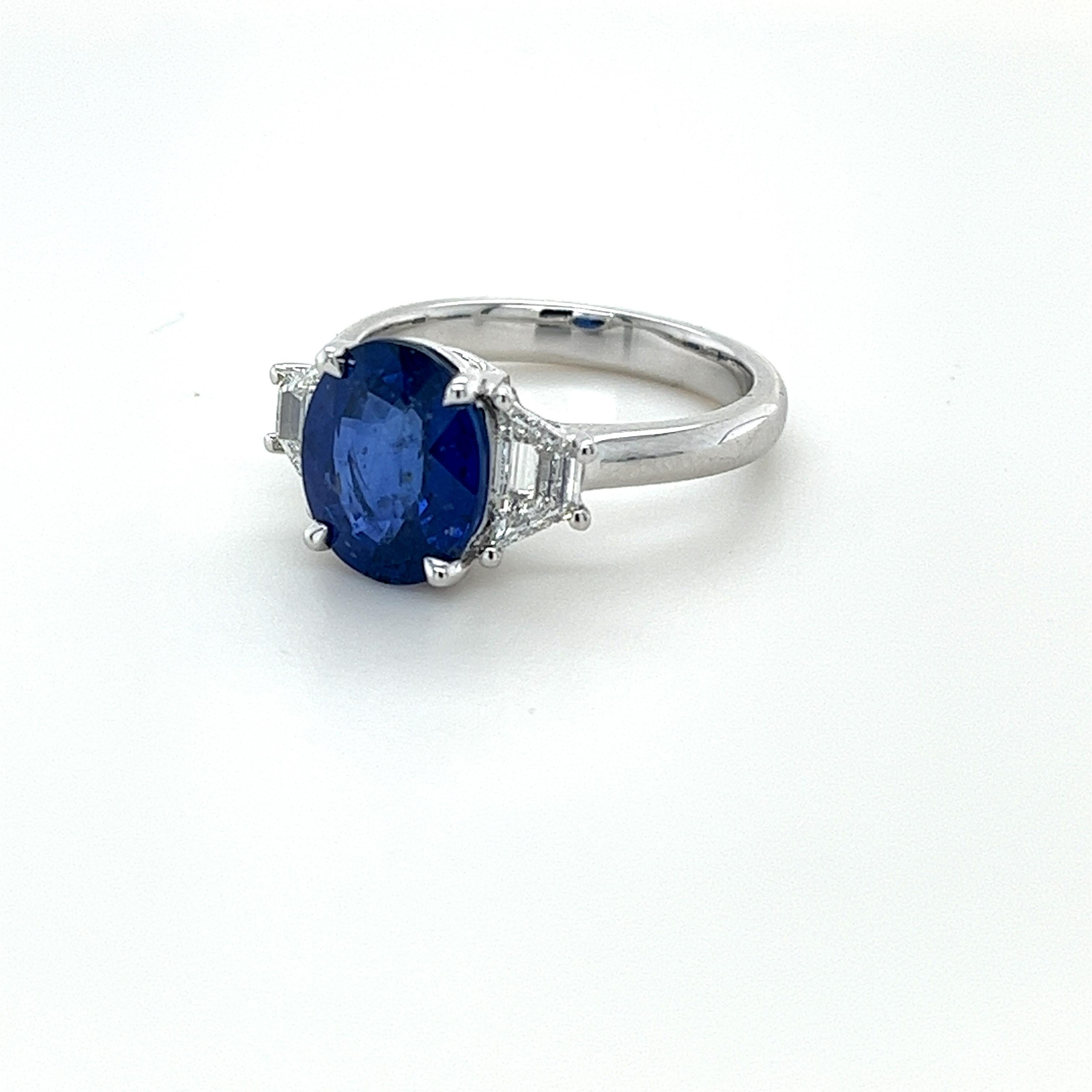 Oval Ceylon Sapphire weighing 3.52 carats
Measuring (10.23x8.33x4.91) mm
Diamonds weighing .62 carats
Diamonds are F-VS
Set in platinum ring
7.21 grams
