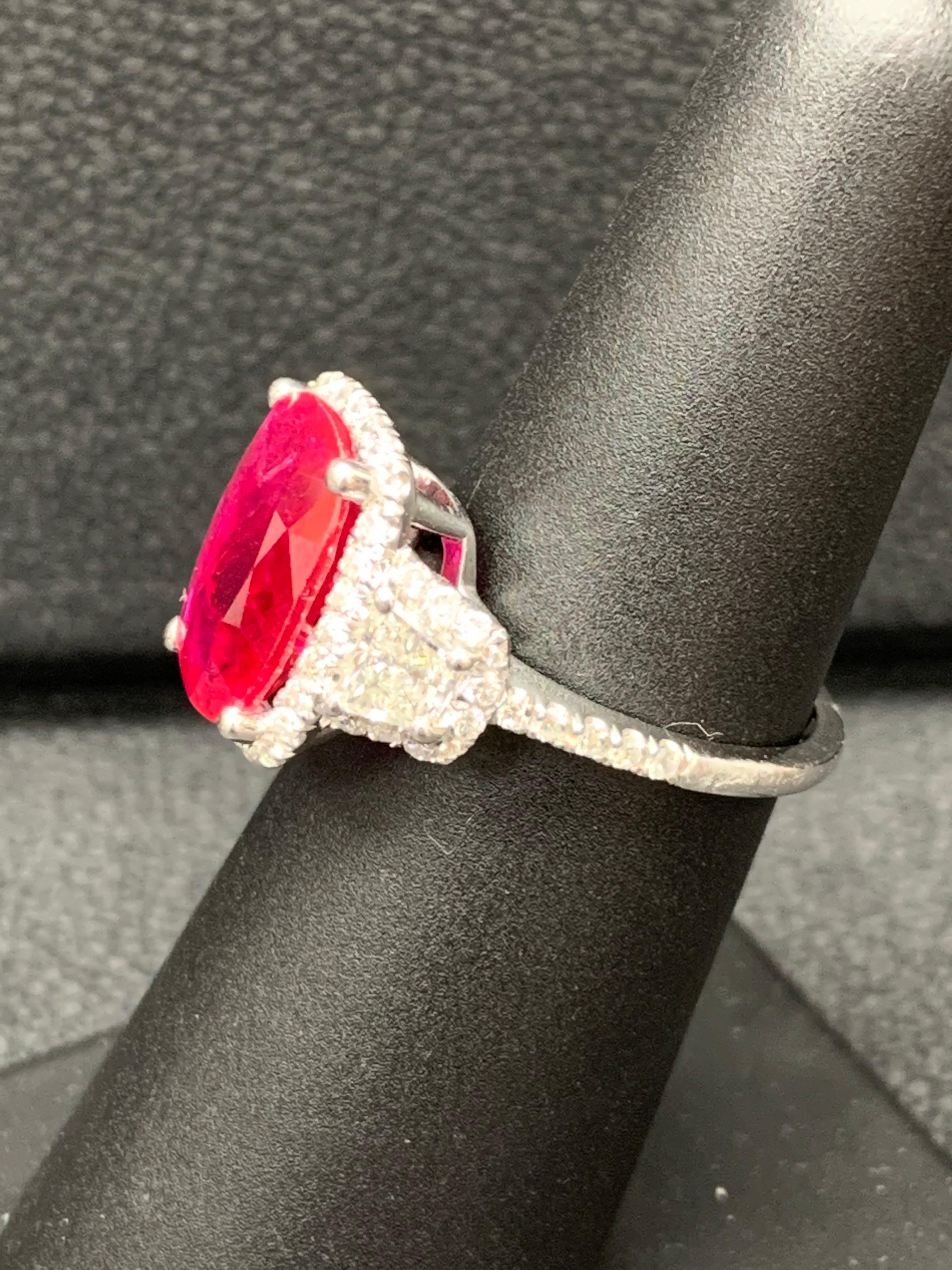 3.52 Carat Elongated Cushion Cut Ruby and Diamond Three Stone Ring in Platinum For Sale 3