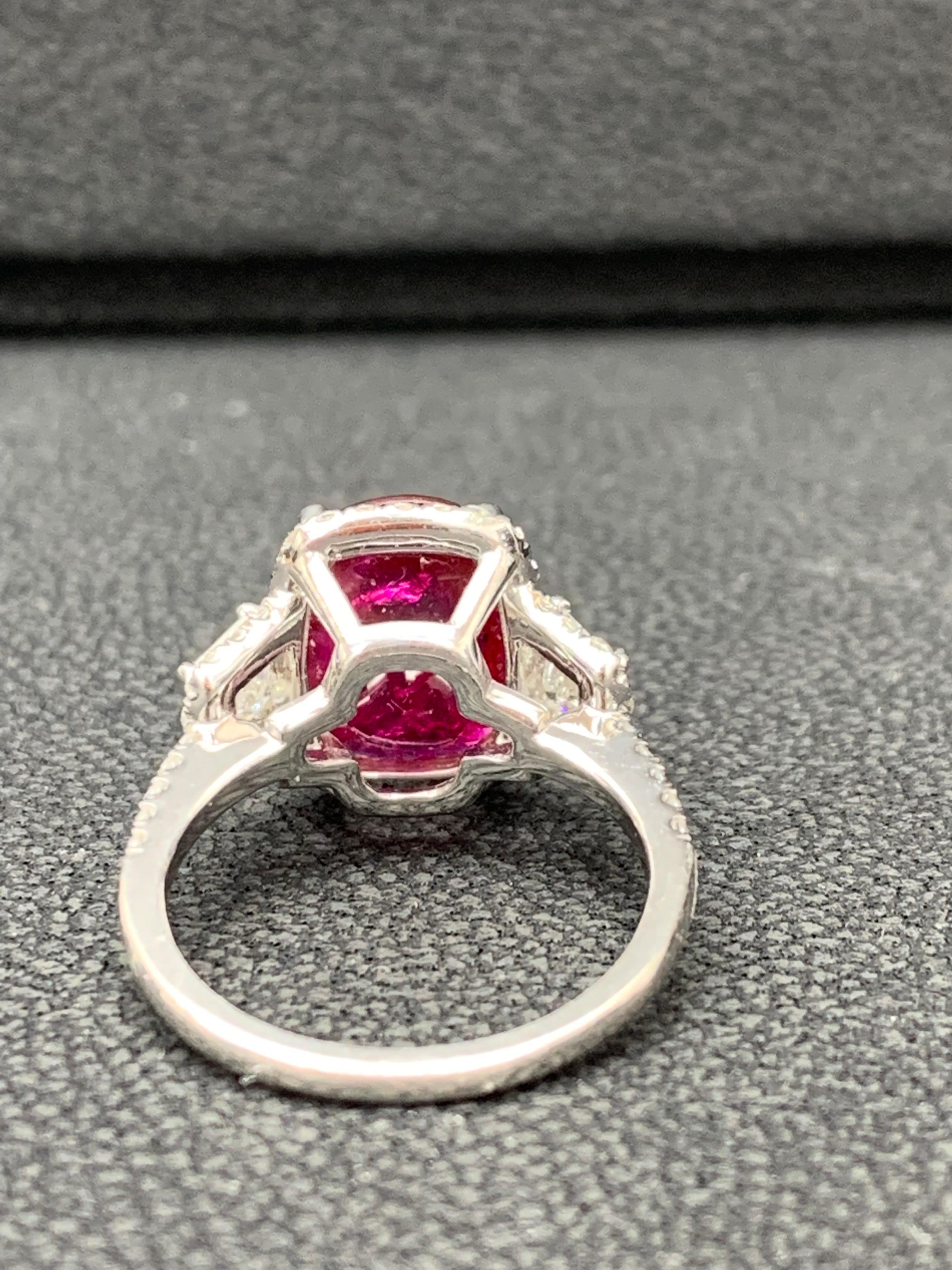 3.52 Carat Elongated Cushion Cut Ruby and Diamond Three Stone Ring in Platinum In New Condition For Sale In NEW YORK, NY