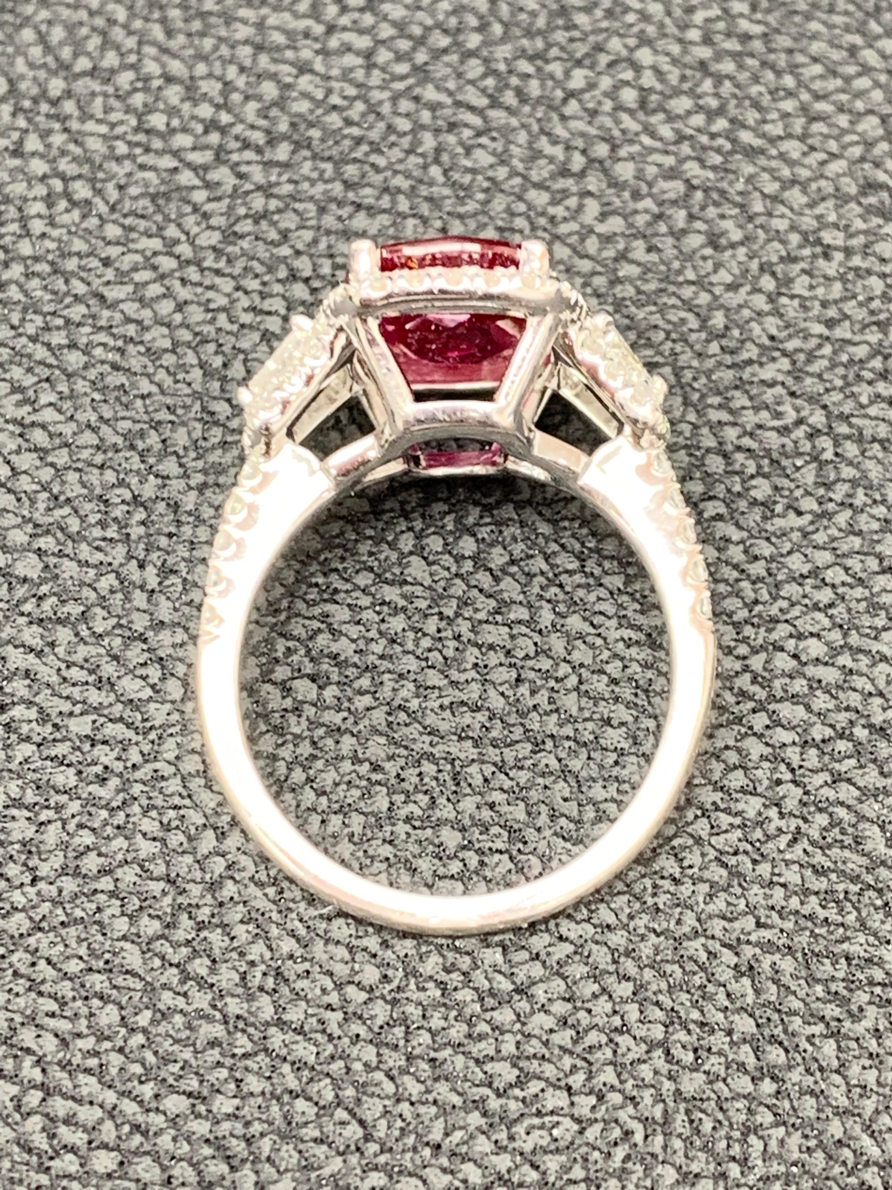 Women's 3.52 Carat Elongated Cushion Cut Ruby and Diamond Three Stone Ring in Platinum For Sale