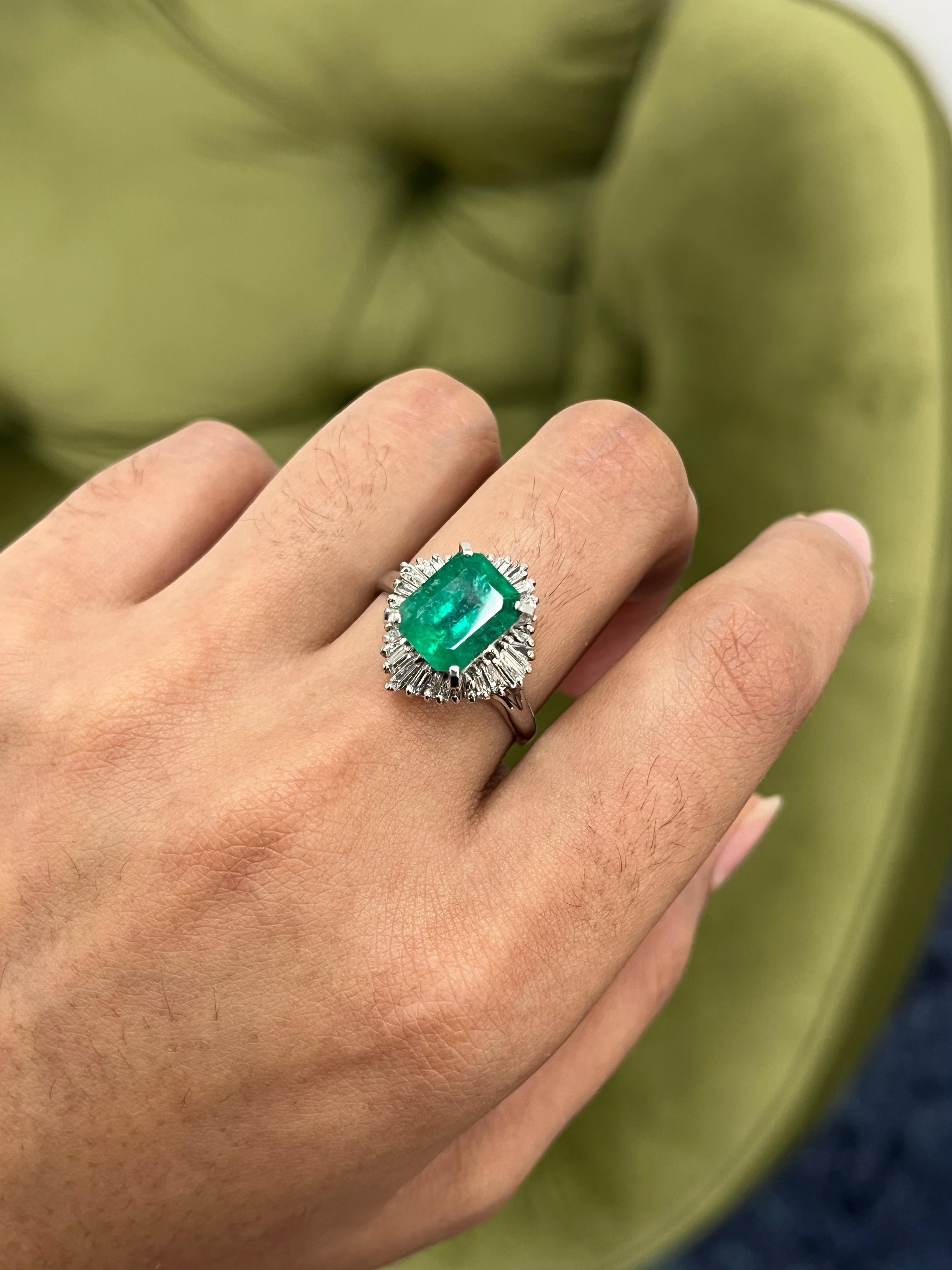 Striking, refined, and timelessly elegant—this 3.52 Carat Emerald Cocktail Ring embodies sophistication and exquisite craftsmanship.
Set in 7.47 grams of premium PT900 platinum, the centerpiece emerald radiates a rich, vivid green that captures the