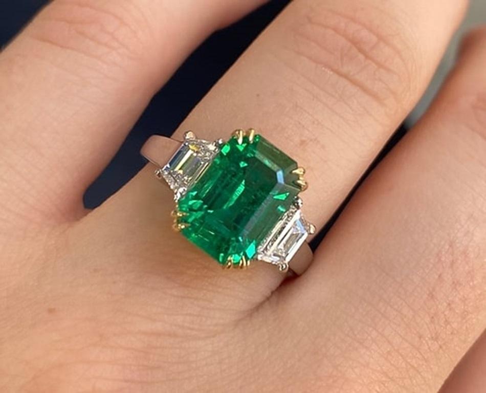 Emerald Cut 3.52 Carat Emerald Three Stone Ring For Sale