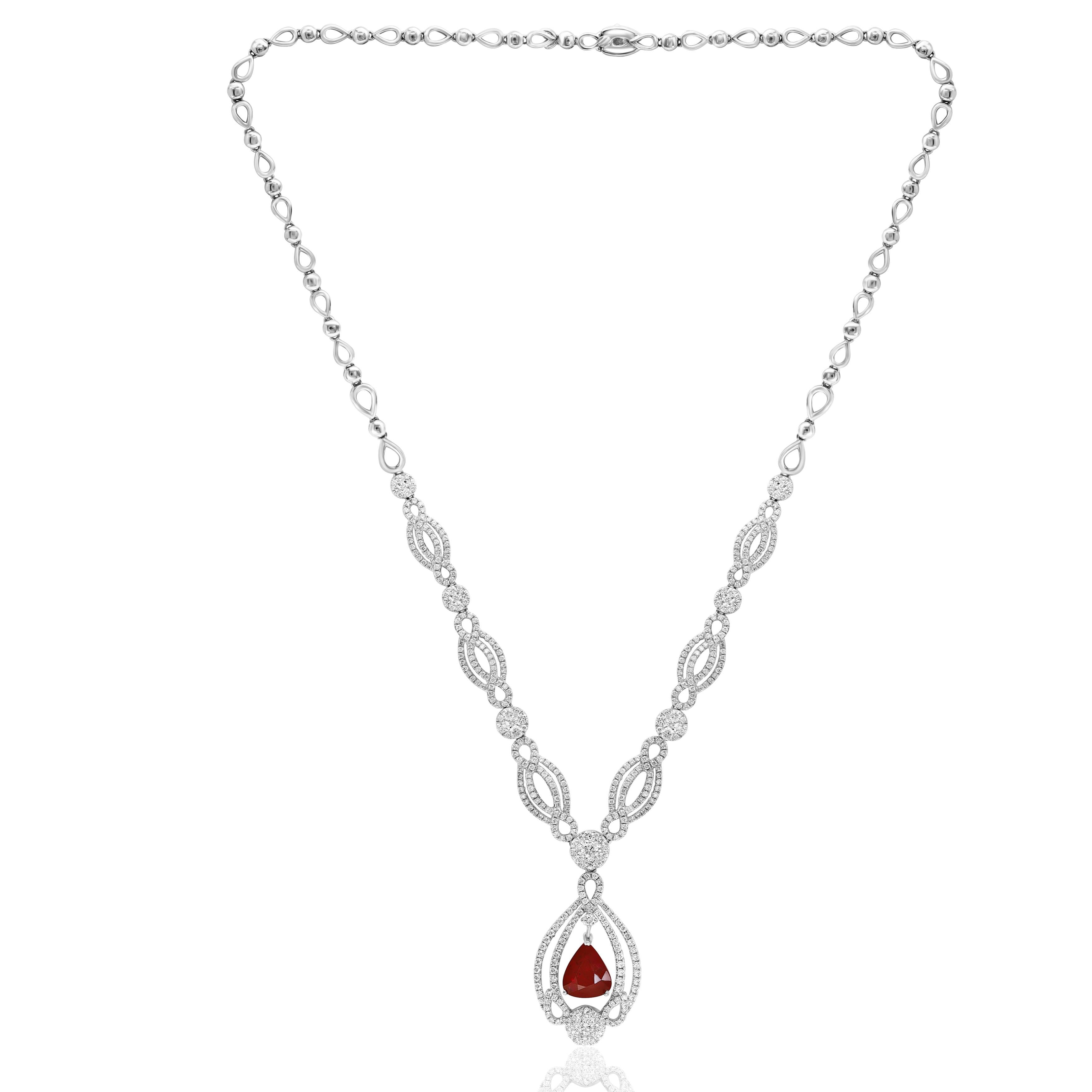 A unique and chic necklace showcasing a drop pendant in an open work design. Radiant Pear Shape Ruby weighs 3.52 carats, and 474 accent diamonds surrounding the ruby weigh approx 4.83 carats in total. Made in 18-karat white gold.

Style is available