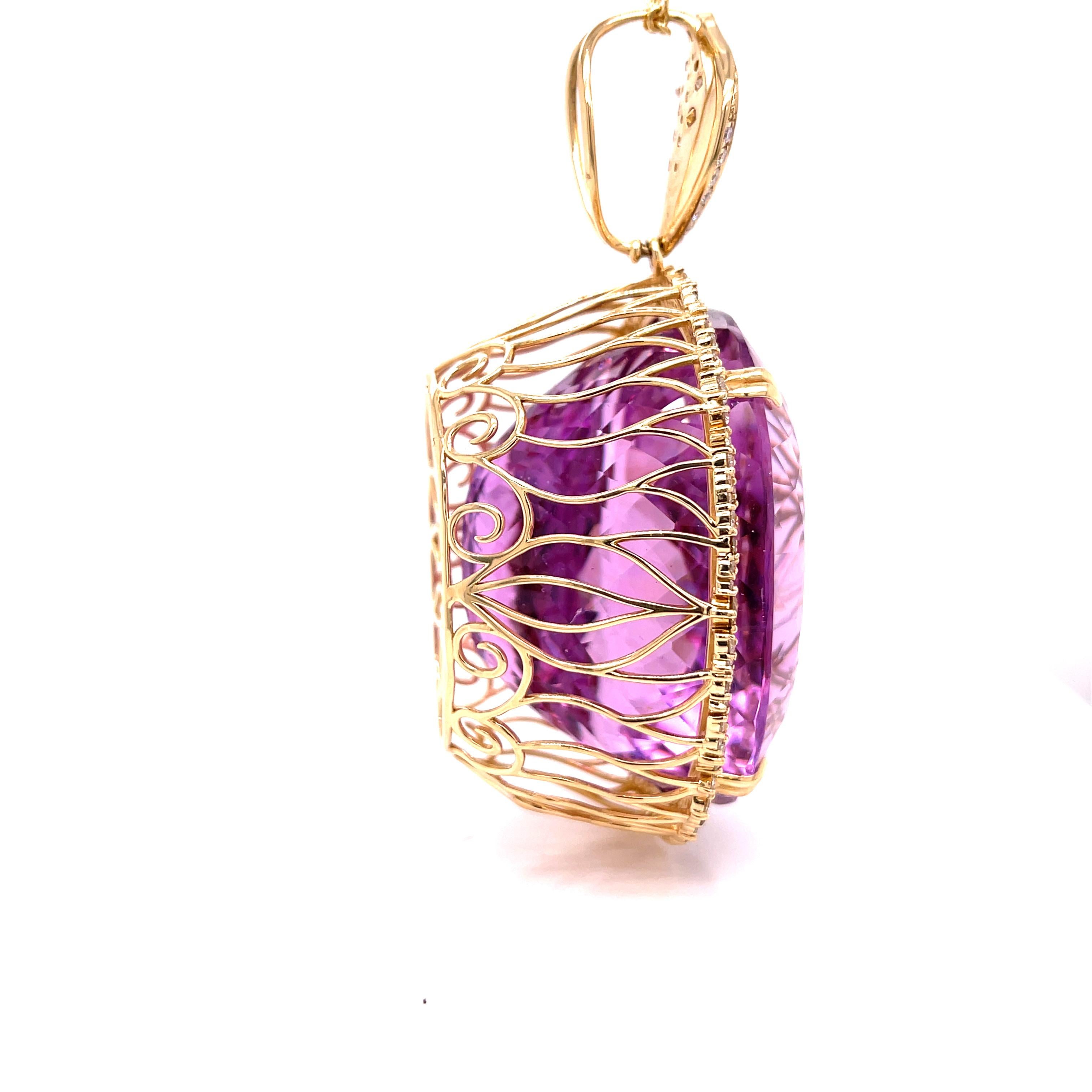 A stone which speaks volumes. A purple beauty, Oval Shaped Kunzite weighing approximately 352.52 Carats with a halo of Multi Colored Diamond weighing approximately, 1.00 cttw along with White Diamonds weighing approximately 3.20 cttw. This pendant